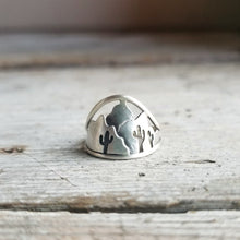 silver mountain ring with cactus silhouettes