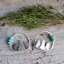 silver forest hoop earrings with turquoise beads with a juniper sprig
