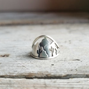 silver mountain ring with cactus silhouettes